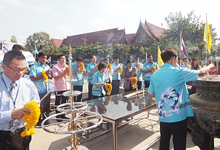 City officials gather in front of city hall to pay respect to the King Taksin monument, city founders and ancestors on the 33rd anniversary of the founding of the city.